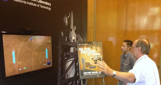 Yours truly, the author, trying his hand at landing the Curiosity Rover. Aug 5, 2012, JPL. Photo by someone else. Yours truly, the author, trying his hand at landing the Curiosity Rover. Aug 5, 2012, JPL. Photo by someone else.