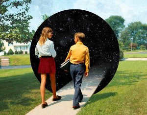 1970S Teen Boy And Girl Walking Down Suburban Street Carrying School Books